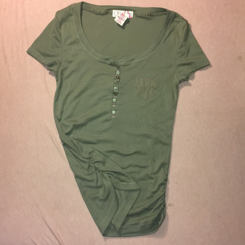 Op green button shirt.